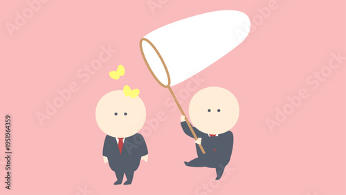 頭に止まった蝶を狙うビジネスマン