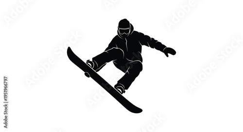 Snowboarder in mid air performing a trick on a snowy slope