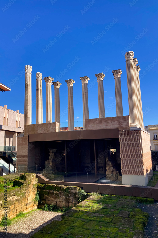 Fototapeta premium Ancient Roman temple ruins showcasing classical columns and historic heritage in Cordoba, Spain.