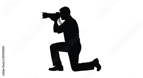 A silhouette of a man in a suit kneeling and taking a picture with a camera