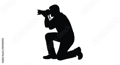 A person kneeling and taking a photo with a camera