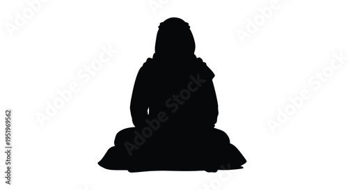 Meditating figure in lotus position a striking black silhouette