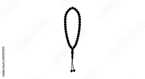 Black prayer beads displayed on a white background a striking silhouette