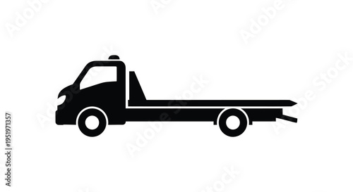 A black silhouette of a flatbed tow truck on a white background