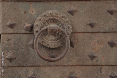 old door knocker, Rustic Iron Door Knocker on Ancient Fortress Gate

