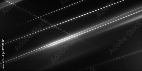 Abstract black and white dynamic lines. This image showcases a series of bright diagonal lines cascading across a stark black canvas, creating a sense of motion and depth.