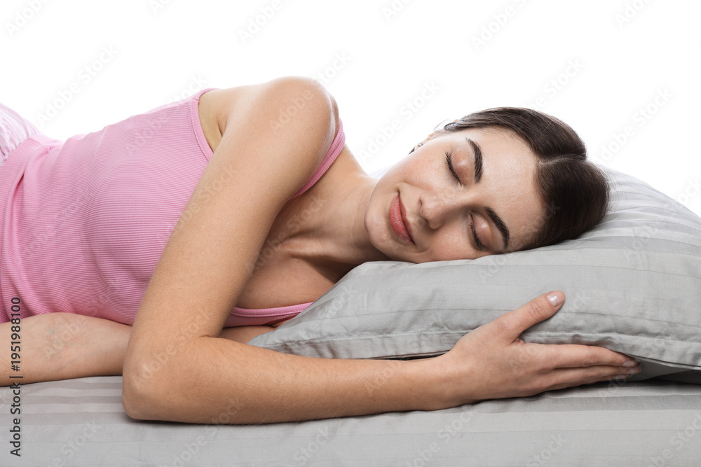 Fototapeta premium Woman sleeping on bed against white background