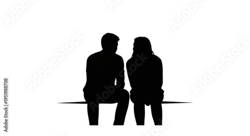Silhouette of a couple sitting together, sharing a quiet moment.