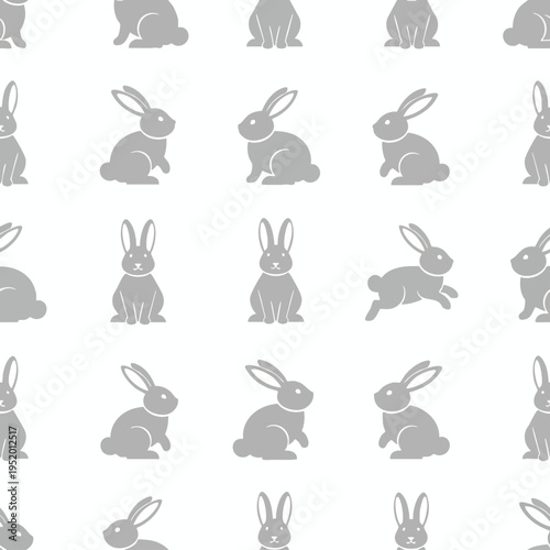 Seamless pattern of grey stylized rabbits in various poses on a white background