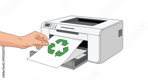 A hand inserts a white paper with a green recycling symbol into the paper tray of a grey laser printer.