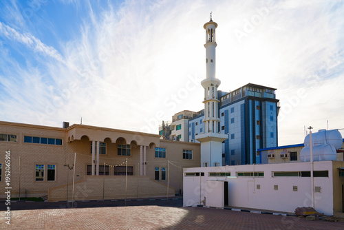 Al-Mina Mosque and its modern minaret in the coastal city of Umluj, Saudi Arabia