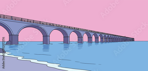 Colorful sunset over a long bridge that stretches over calm water with sand on the shore