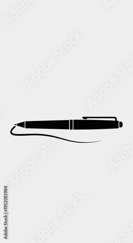 Black pen with cord attached end.