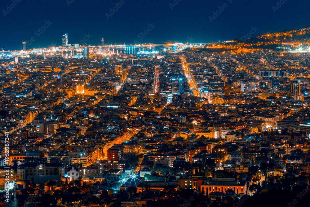 Fototapeta premium Elevated panoramic view of Barcelona city at night