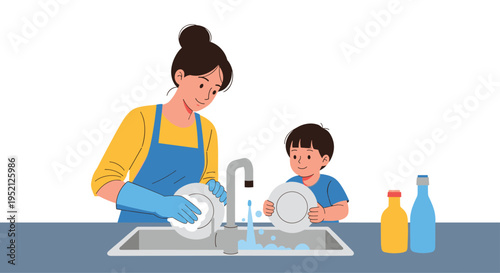 Mother and young son doing housework together by washing dishes at the kitchen sink in a warm and cozy home scene.