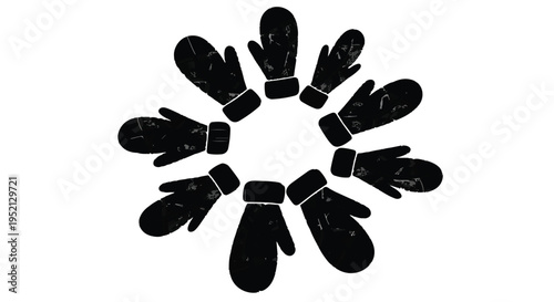Winter warmth symbolized by a circular arrangement of black mittens against a white background.