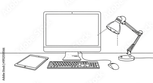 Desk setup with computer, keyboard, tablet, mouse, and lamp.