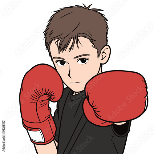 Boy practices boxing with red gloves in a training session at a gym on a weekday afternoon