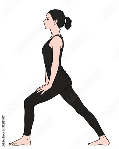 Woman practicing yoga in a studio during morning hours with focus on her form and balance in a standing pose