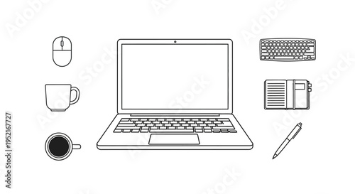 Laptop computer with office supplies.