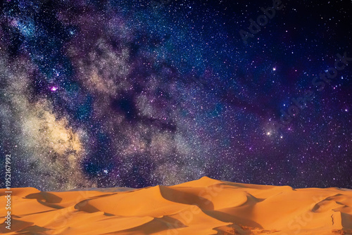 milky way and milky way over the desert in the night. the stars in the middle.