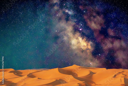 milky way and milky way over the desert in the night. the stars in the middle.