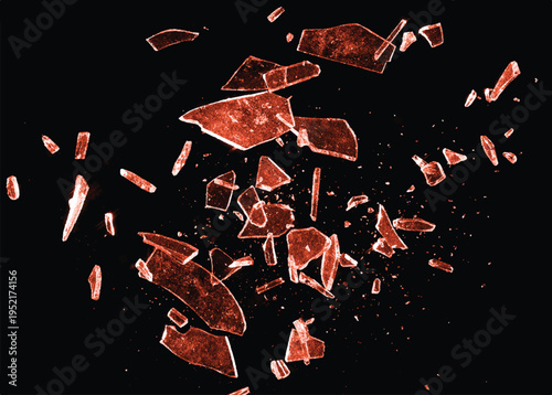 Shattered red glass close-up on black background. Texture of broken glass.	