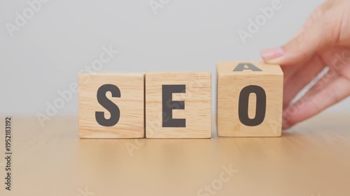 Hand change Wooden block from SEA to SEO. Search Engine Optimization, SEM, Advertising, Marketing, Idea, Strategy, Keyword, Content and technology concept