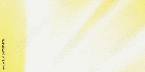 Soft abstract blend of warm yellow and neutral white hues creating a gentle gradient effect