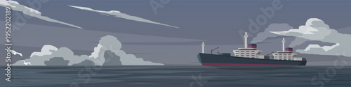 Horizontal or Landscape view of transport large oil tanker is sailing in the middle of the sea. Lonely and vast atmosphere at sea in the evening. Under the sky and clouds with free space.