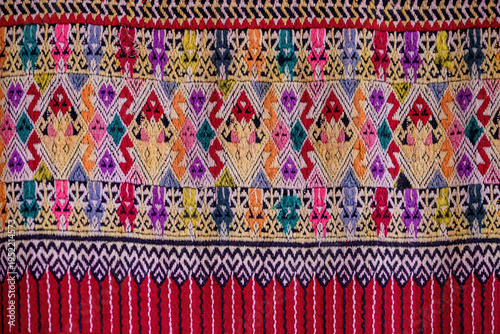 Close up traditional Thai woven fabric patterns beautiful background.