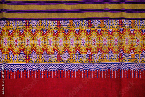Close up traditional Thai woven fabric patterns beautiful background.