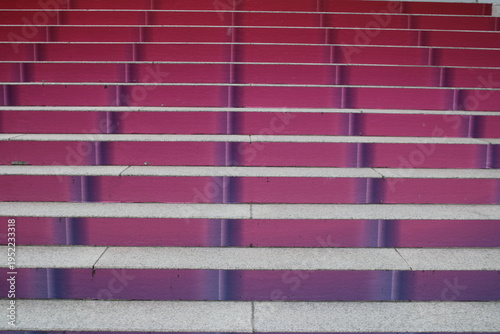 Rose-colored steps outside of building