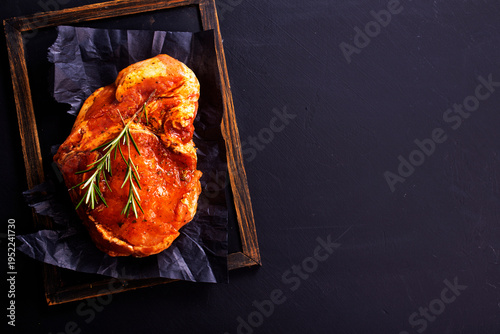 Raw meat. Raw pork ribs in marinade with spices, rosemary, tomato sauce and garlic