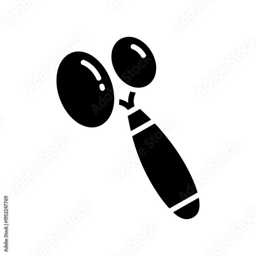 A simple black illustration depicts a maraca with a distinct handle and rounded body silhouette