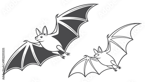Two Black and White Bats Flying in Flight for Halloween Horror Design or Nature Illustration Projects