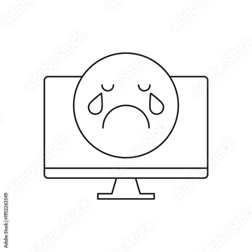Crying sad face emoji on computer display