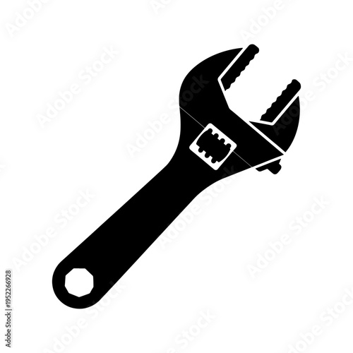 A striking black silhouette depicts a well used adjustable wrench emphasizing its functional design silhouette