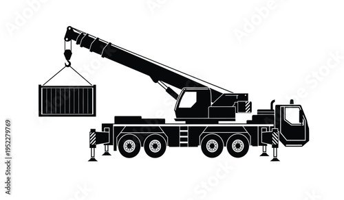 Black silhouette of a mobile telescopic crane lifting a heavy shipping container on a site