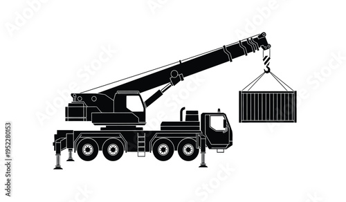 A heavy duty mobile crane lifting a large metal freight container for construction site logistics
