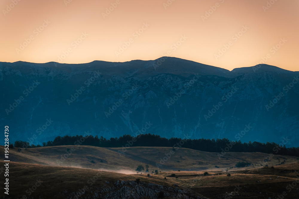 Obraz premium Majestic limestone cliffs of Mount Lebrsnik on the border of Bosnia and Herzegovina and Montenegro, scenic mountain landscape in the Dinaric Alps.