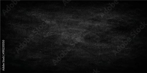 A textured blackboard with a worn aesthetic, featuring a dark, rough surface. 