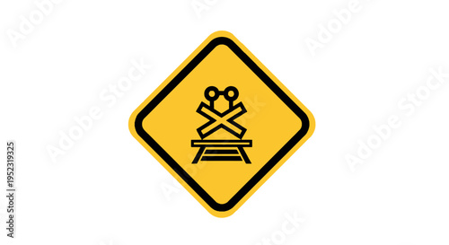 A yellow diamond-shaped sign with black border and black symbol warning of a railway crossing