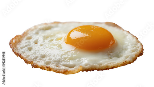 Billede på lærred Perfectly cooked sunny-side up fried egg with a vibrant yellow yolk and crispy e