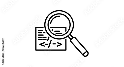 Magnifying glass on coding document.