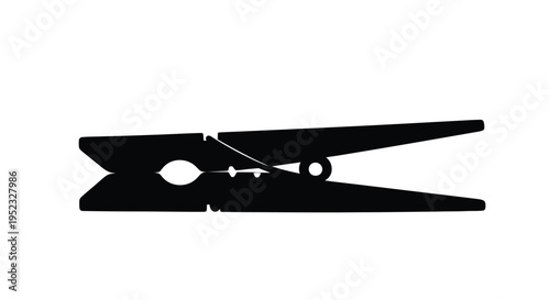 Simple black silhouette of a wooden clothespin isolated on white