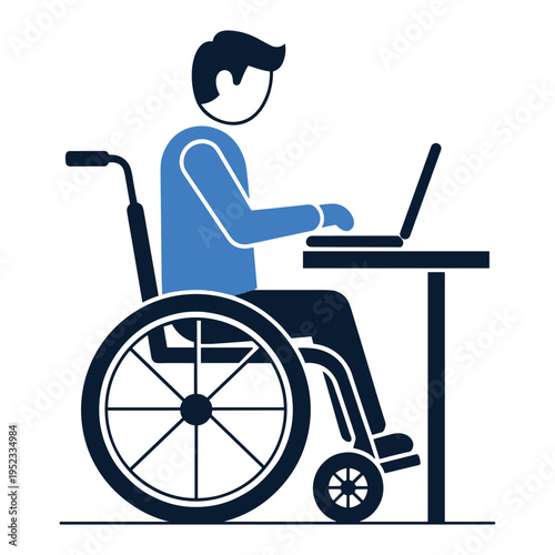Man in wheelchair working on laptop at desk