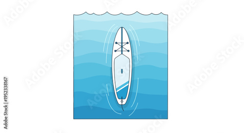 Overhead view of a stand-up paddleboard on blue water, ripples visible