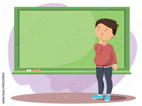 hinking school boy standing near blackboard