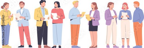 Team of office employees collaborating and discussing documents in pairs wearing colorful smart casual clothing